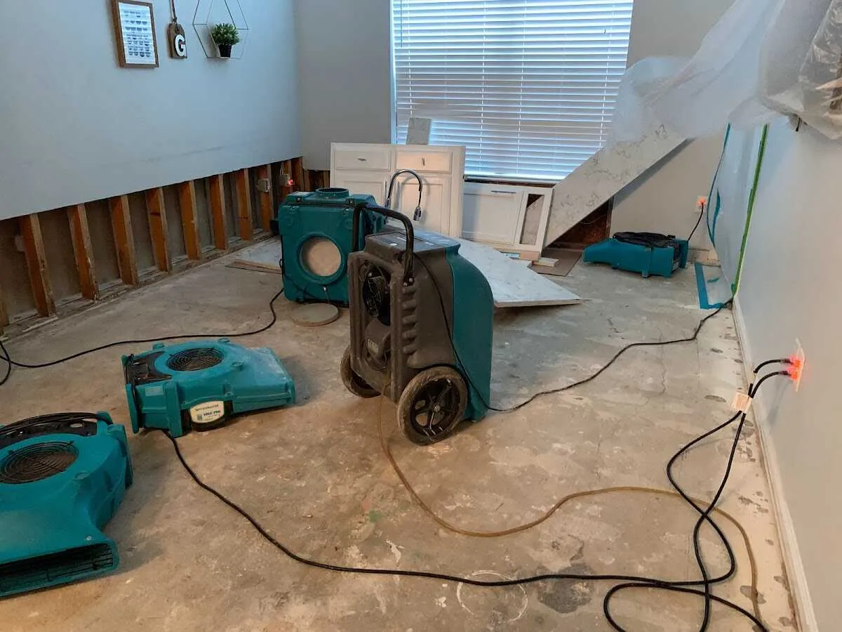 Dehumidifier in flood-cut room for Water Damage Restoration in Savoy